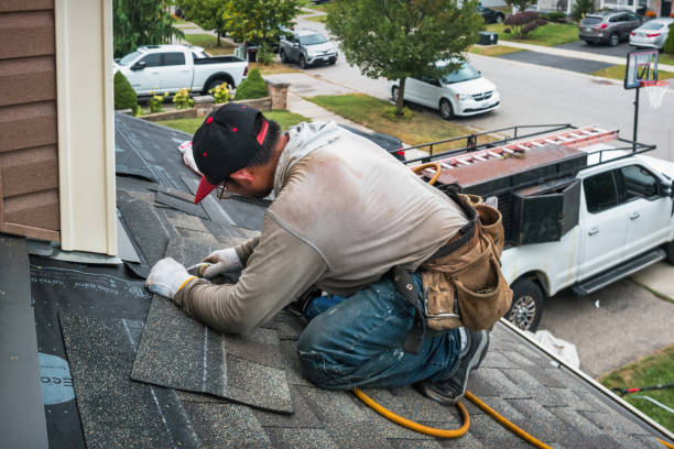 Professional Roofing technician working in Menan, ID